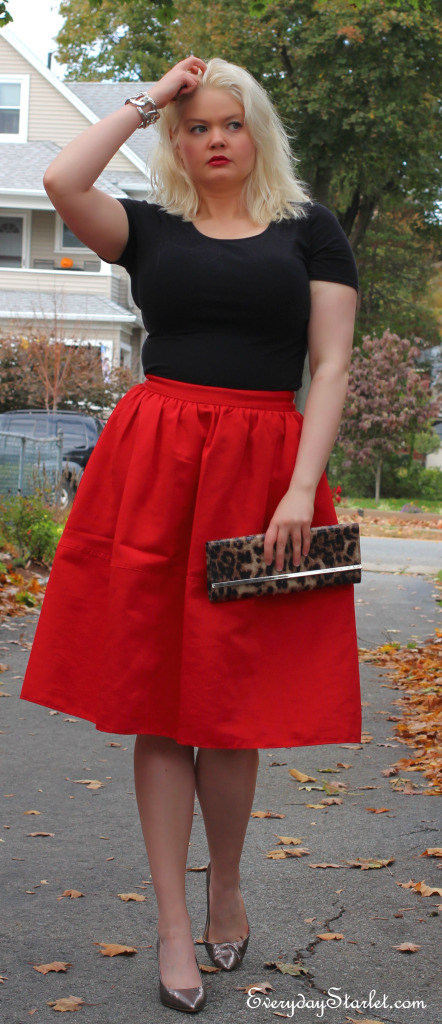 red 50s skirt red lips leopard clutch metalic pumps messay hair