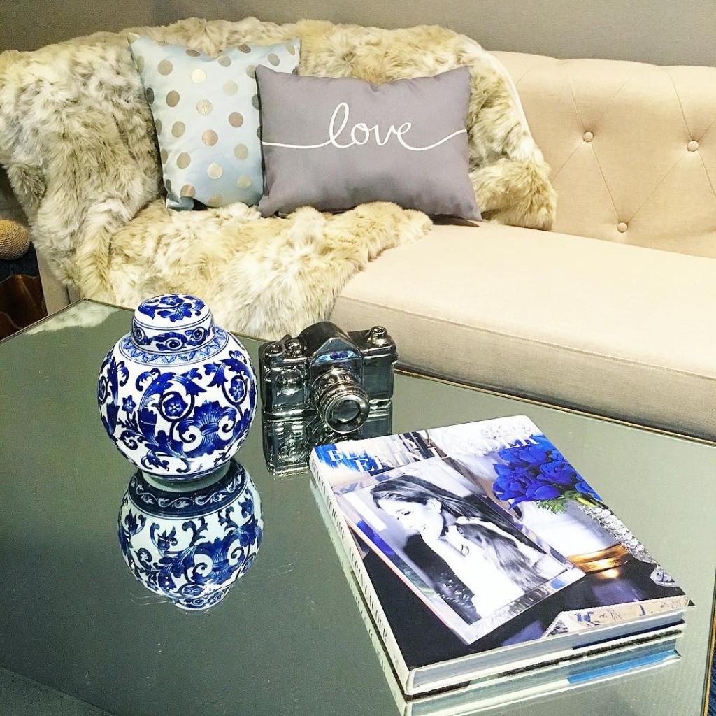 I did the @jossandmain white sofa challenge...leopard print, a camera, and a beauty book= Me #hearthome